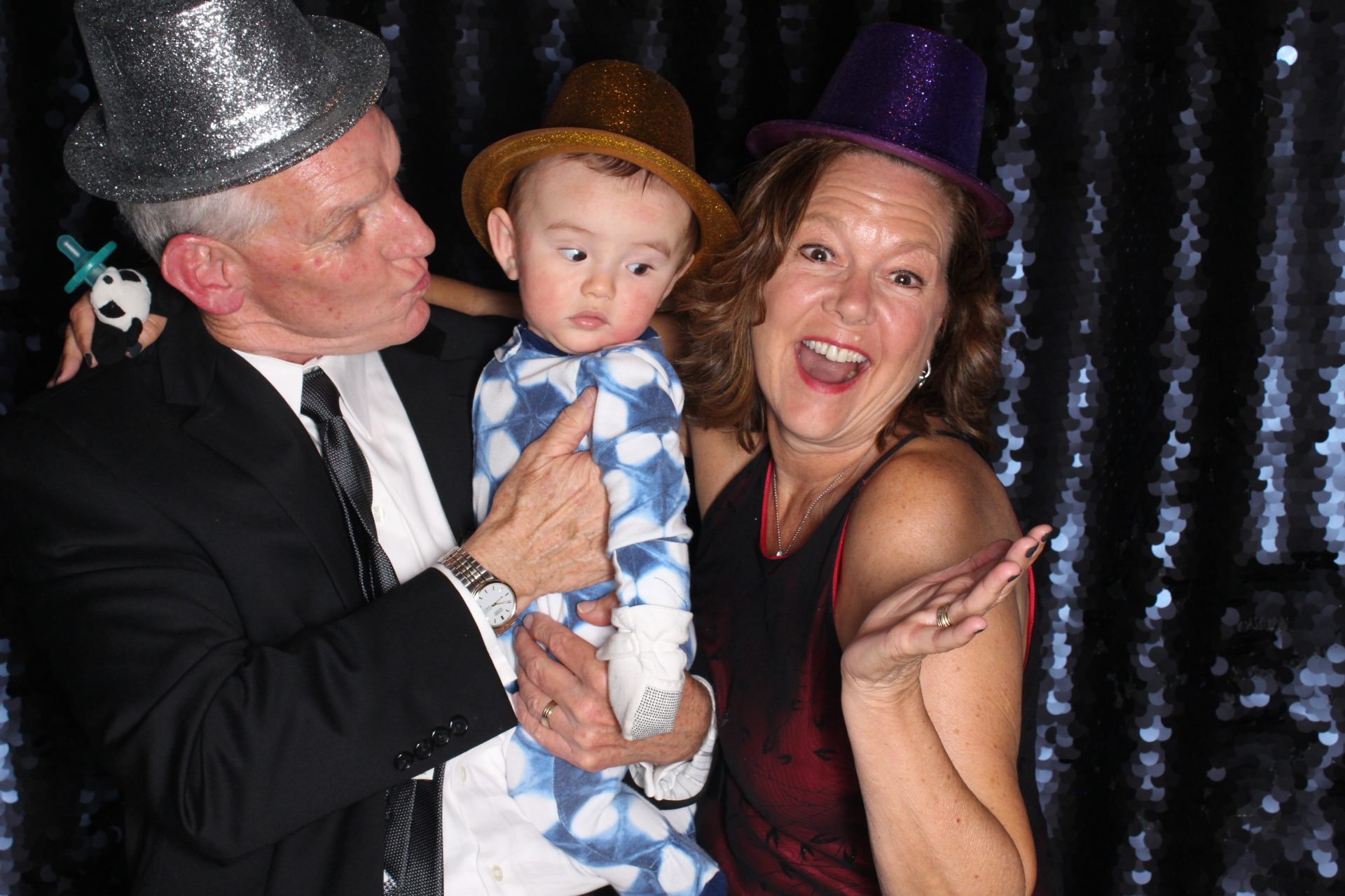 Grandparents Taking Picture with Kid